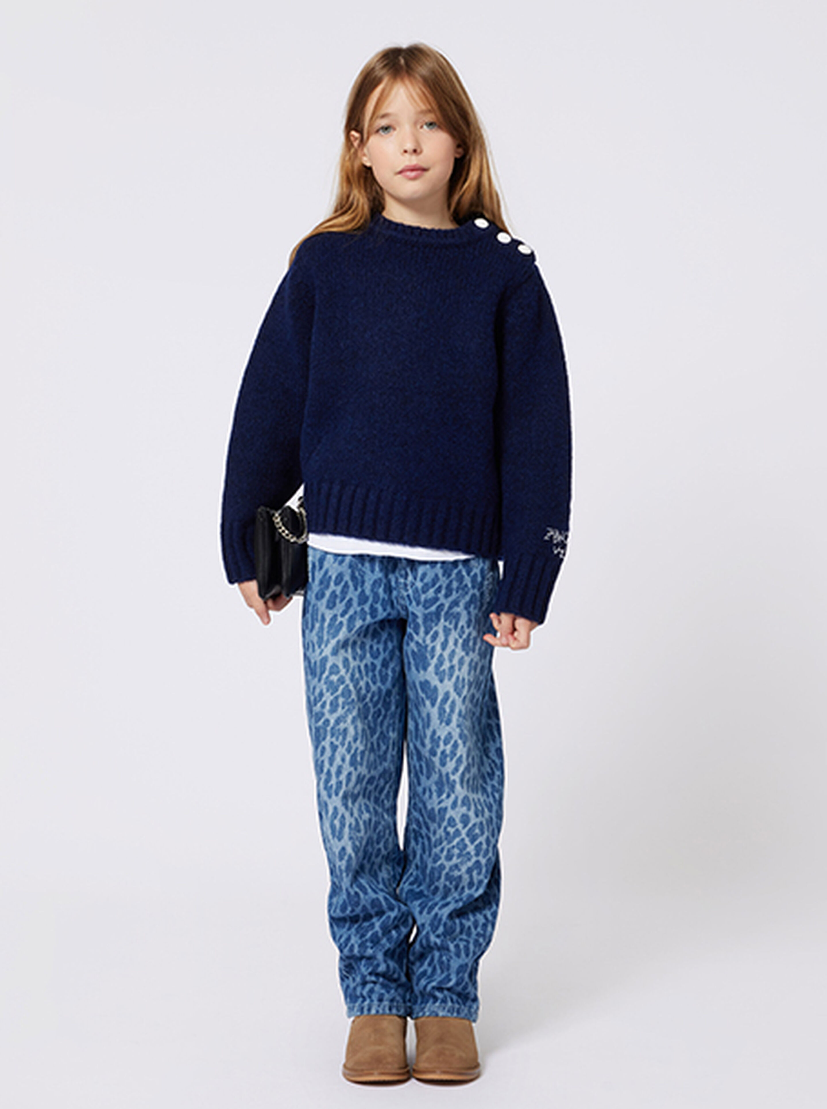 Kids Around designer palette for Winter 2025 with stylish deep blues and cozy neutral hues