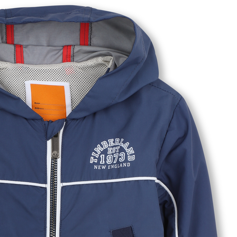 CORTAVIENTOS CON CAPUCHA TIMBERLAND 
                        NI&Ntilde;O