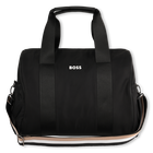 Bolsa de pa&ntilde;ales fabricada en textil recubierto BOSS 
                    UNISEXO