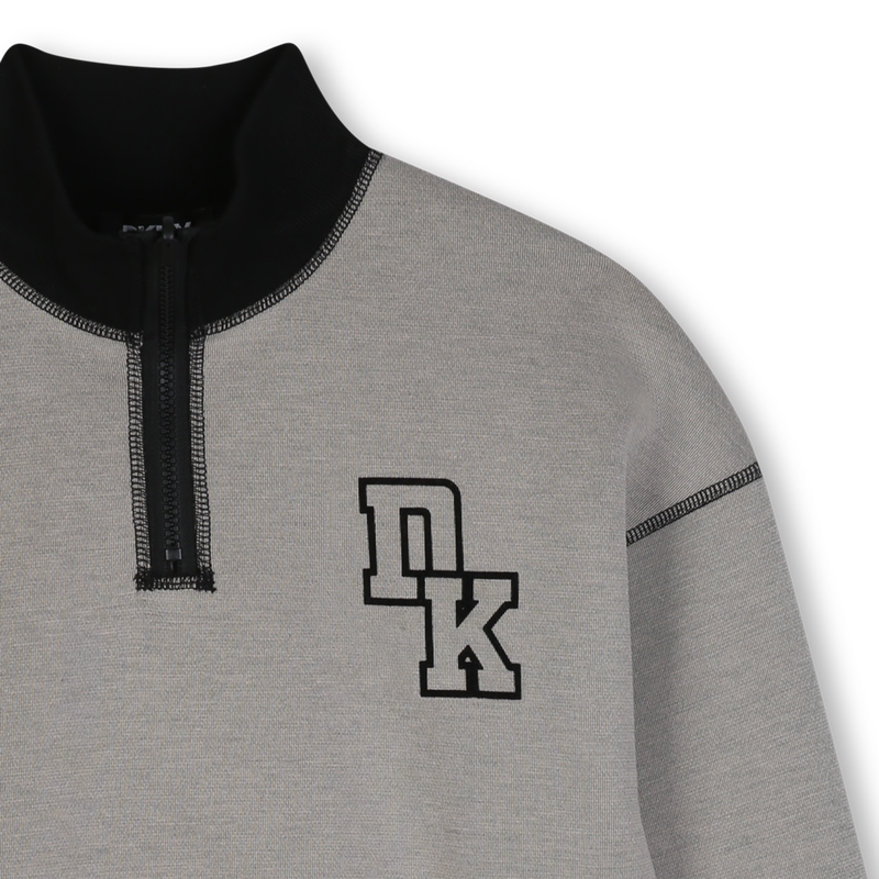 Sudadera reversible DKNY 
                        NI&Ntilde;O