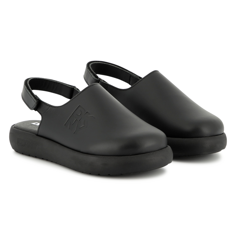 Zuecos de cuero con velcro DKNY 
                        UNISEXO