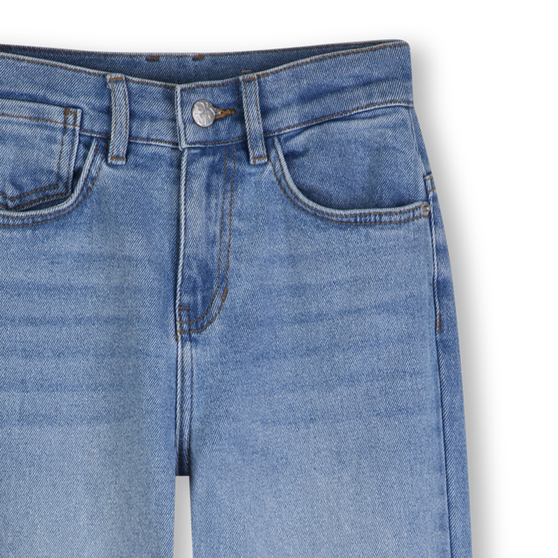 JEANS DE 5 BOLSILLOS DKNY 
                        UNISEXO