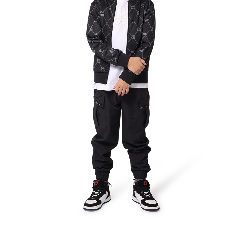 Pantal&oacute;n de ch&aacute;ndal holgado HUGO 
                        NI&Ntilde;O