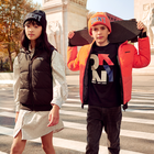 Plumas reversible con capucha DKNY 
                    NI&Ntilde;O
