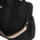 Bolsa de pa&ntilde;ales fabricada en textil recubierto BOSS 
                    UNISEXO