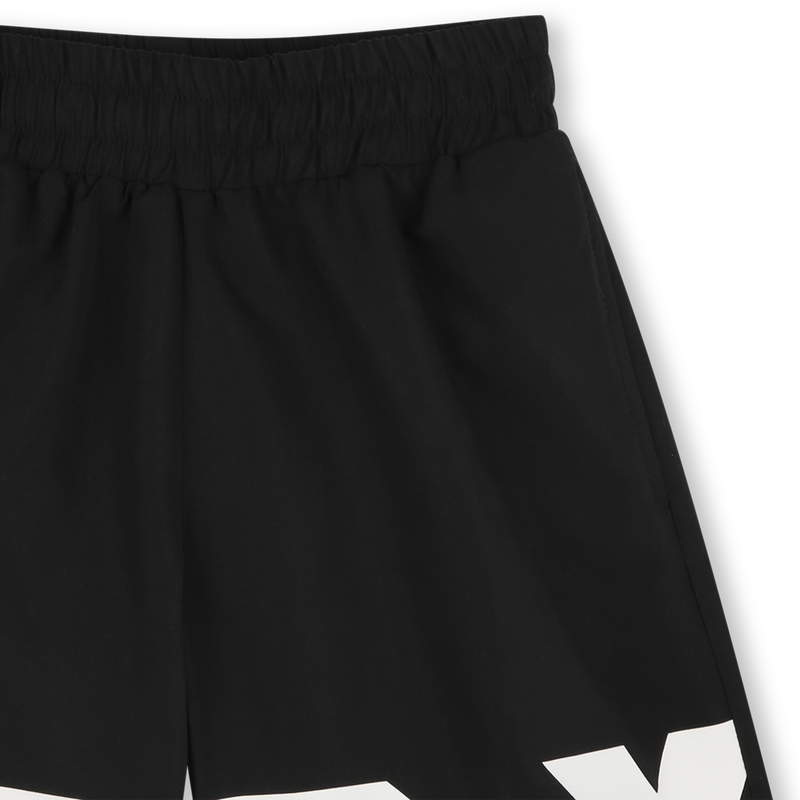 Ba&ntilde;ador con bolsillos DKNY 
                        NI&Ntilde;O