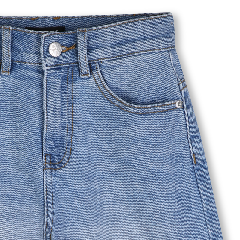 BERMUDAS VAQUERAS DKNY 
                        UNISEXO