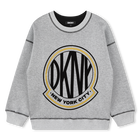 Su&eacute;ter reversible DKNY 
                    UNISEXO