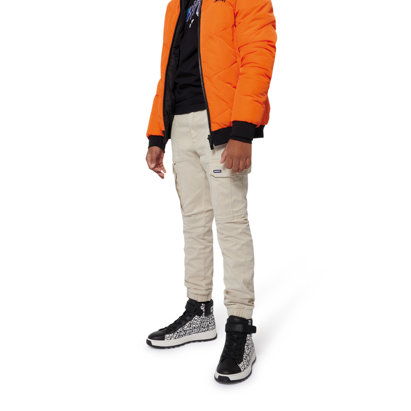 Plumas reversible con capucha DKNY 
                        NI&Ntilde;O