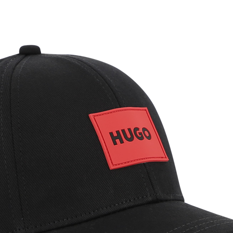GORRA AJUSTABLE HUGO 
                        UNISEXO