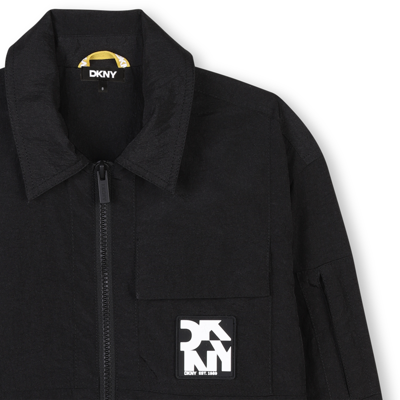 Chaqueta con cremallera DKNY 
                        UNISEXO