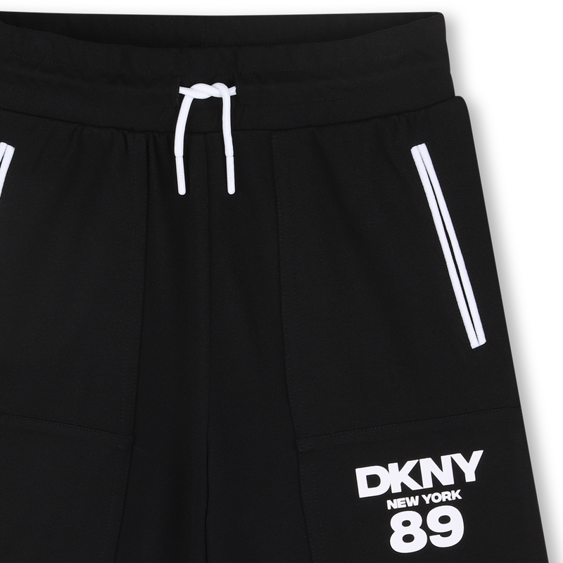 BERMUDAS DKNY 
                        UNISEXO
